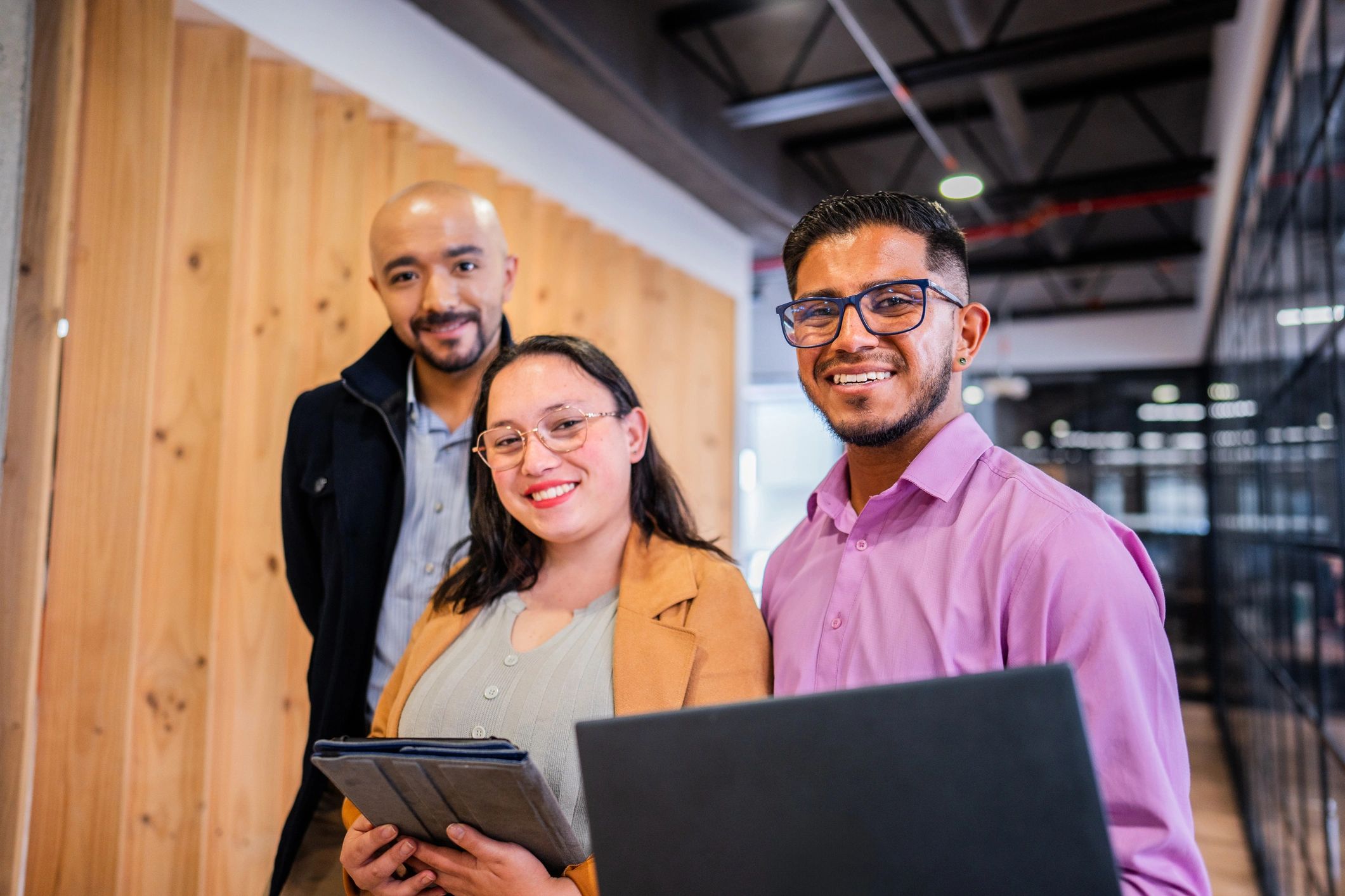 IT team portrait modern office